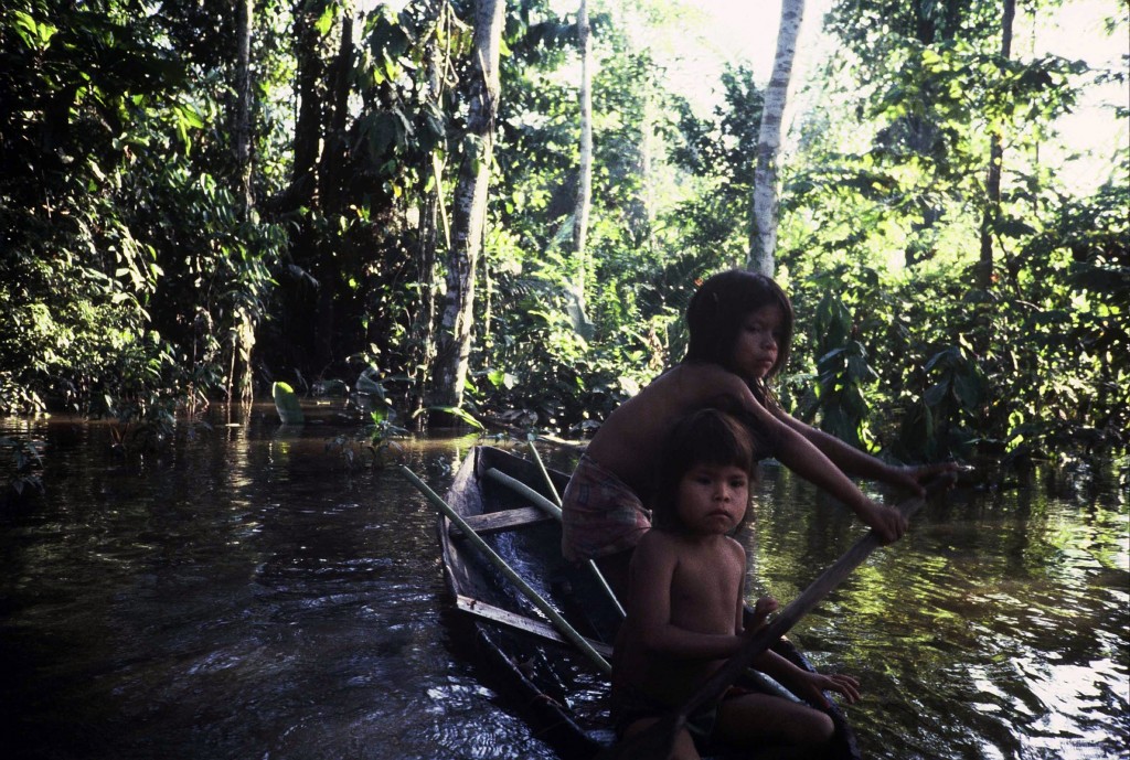 Children in the Amazon River near Iquitos, Peru