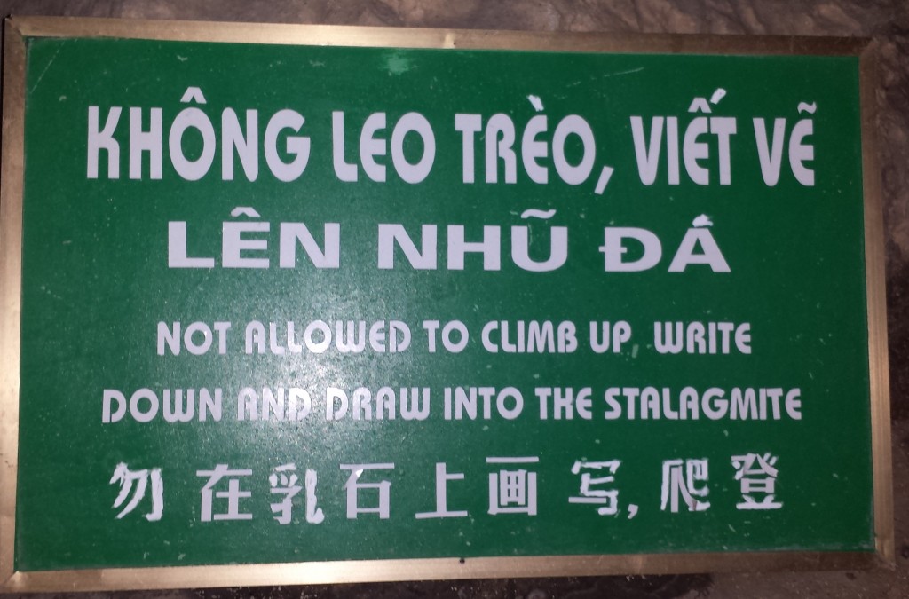 Sign in cave at Halong Bay, Vietnam