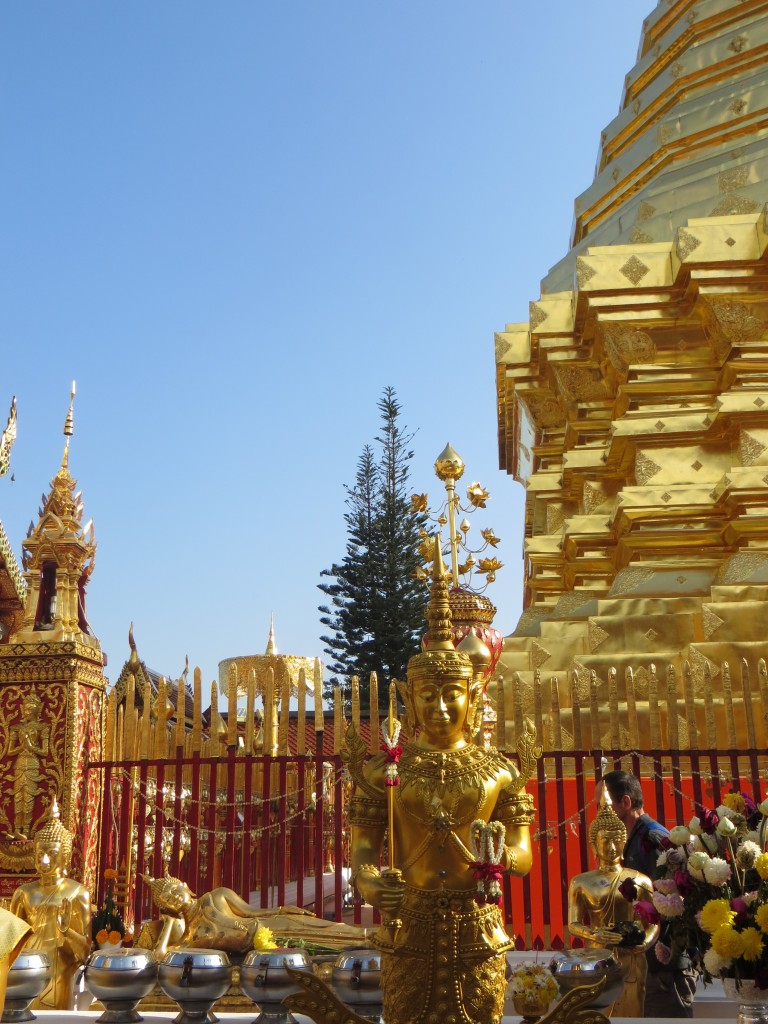 Buddha statues surrounding the chedi at Wat Phra That Doi Suthep